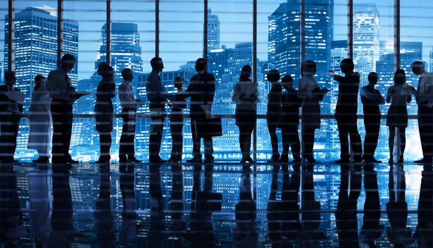 multi-ethnic_business_colleagues_working_in_a_ny_office