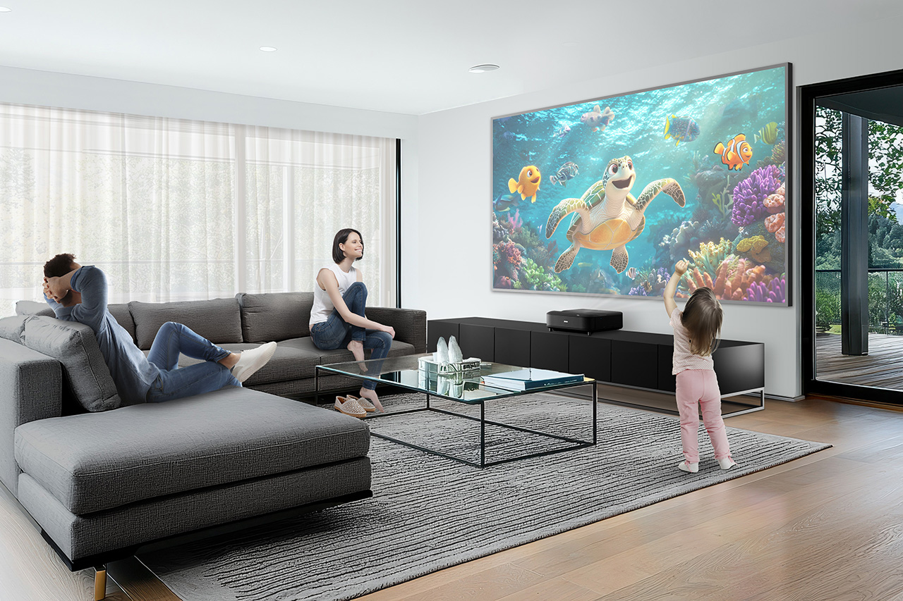 Modern living room with a fireplace and large windows.